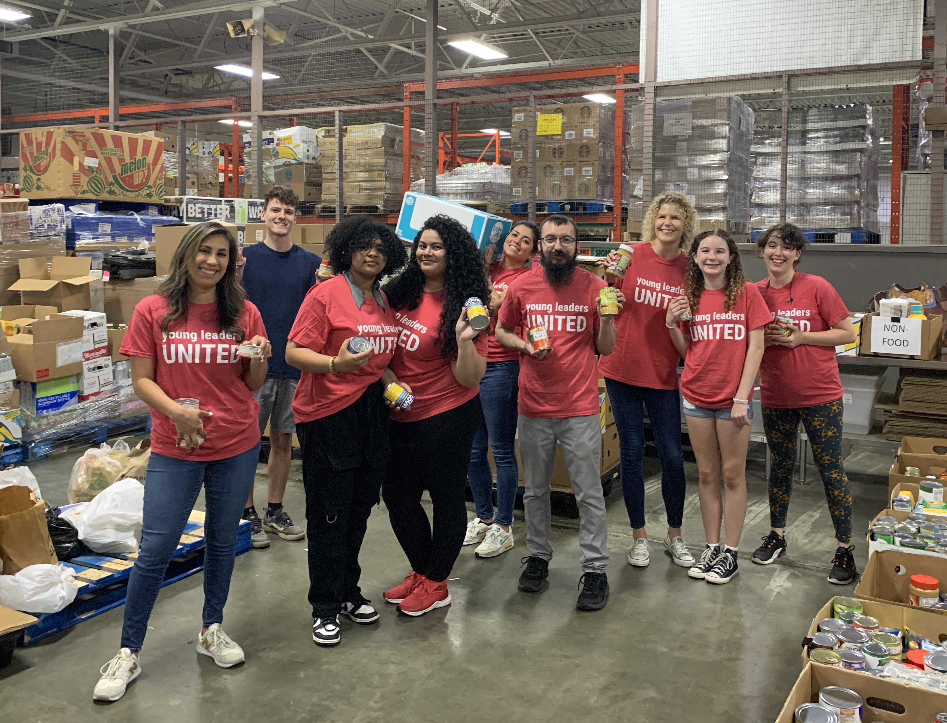 Young Leaders volunteering at the Food Center warehouse