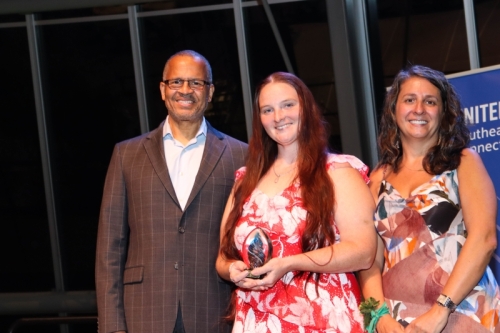 Koralee S. Lawrence (center) accepts the Sara Chaney Heart of the Community Award.