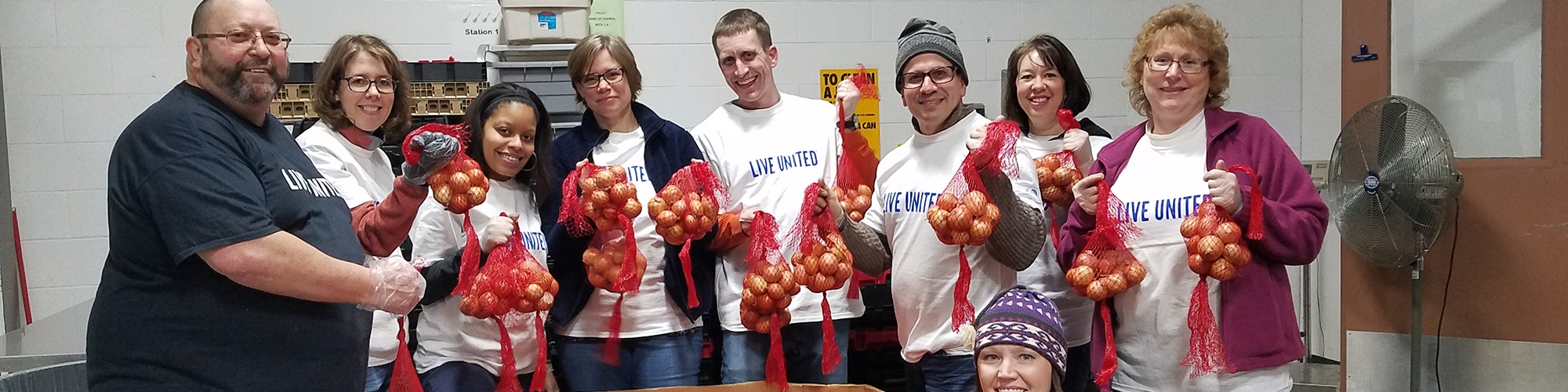 Volunteers at the Food Center warehouse