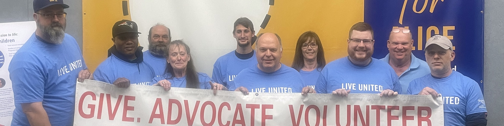 Members of the Union Counseling class holding the Labor banner