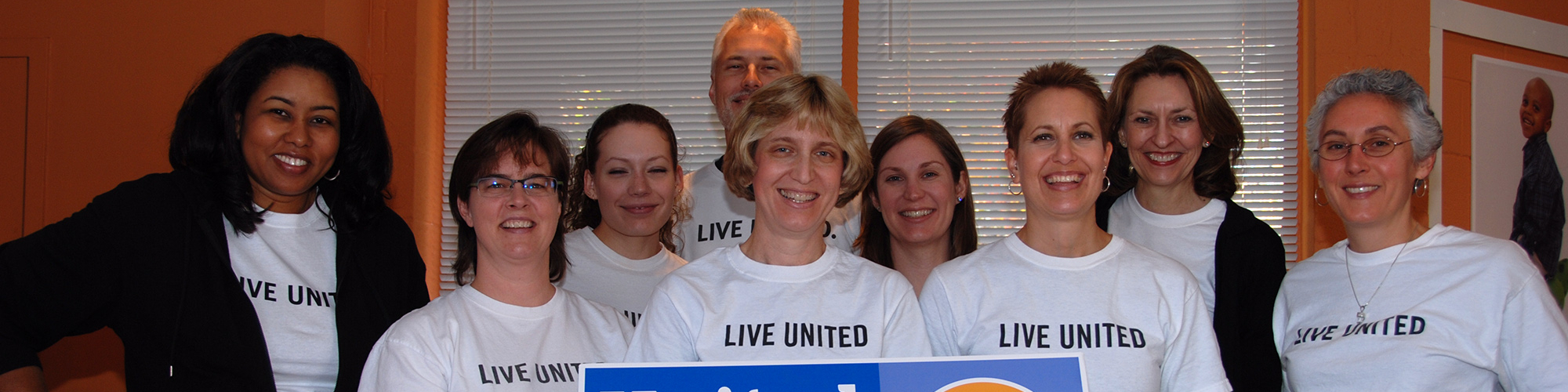 Group of employees wearing Live United tshirts who run their company's United Way campaign