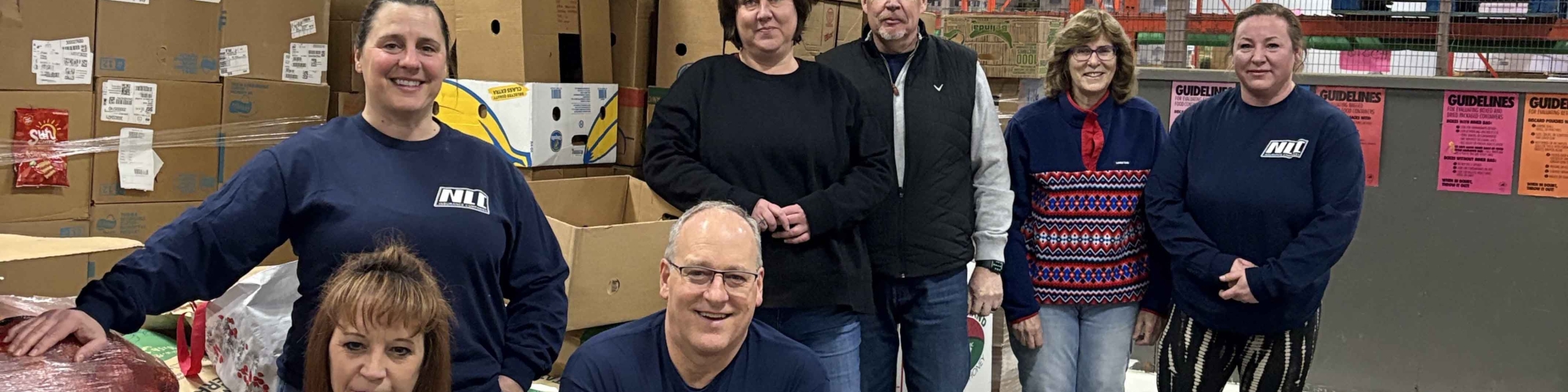 NLC Insurance Companies volunteering at the Food Center