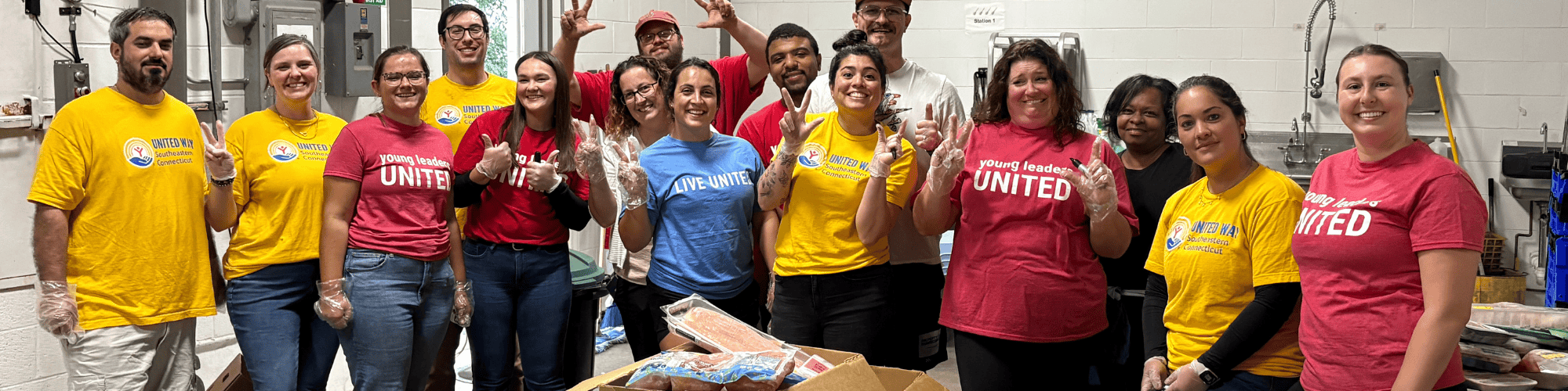 Young Leaders volunteering at the Food Center warehouse
